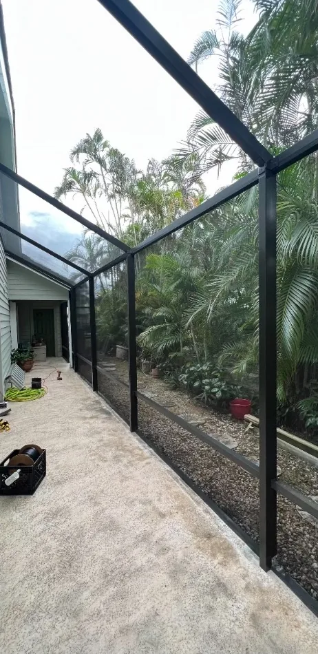 A screened side walkway